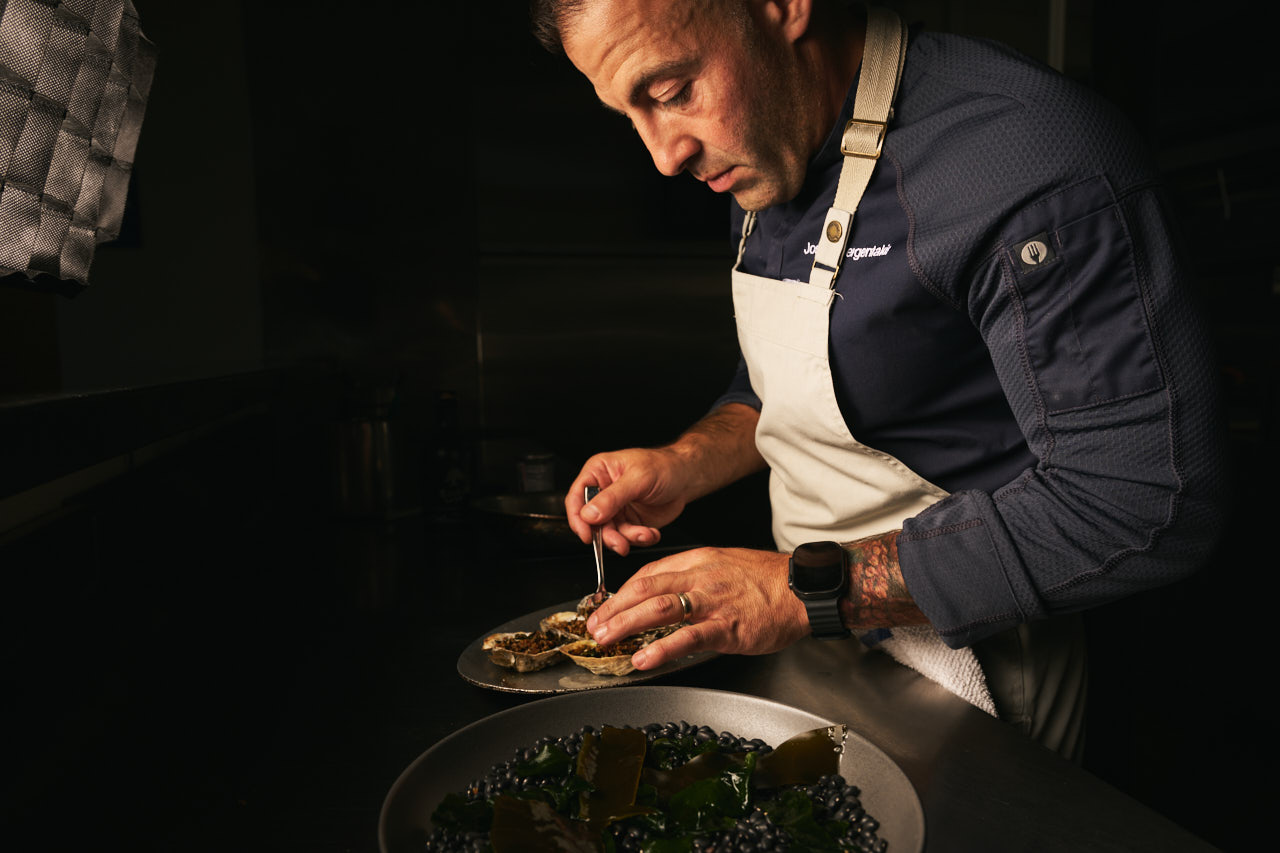 Chef Joey Sergentakis plating food